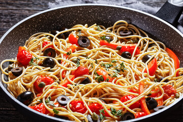 spaghetti alla caponata in a pan, top view