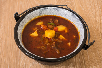 Hungarian Goulash or Gulyas Served in a Small Cauldron