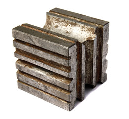 Metal cube with shaped recesses. Design cube. A tool for a jeweler.