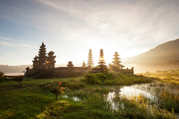 Morning view at Tamblingan Lake, Singaraja Bali. this lake part of twin lake in north of Bali. here have a Hindu Temple. this place very beautiful when you come in sunrise time