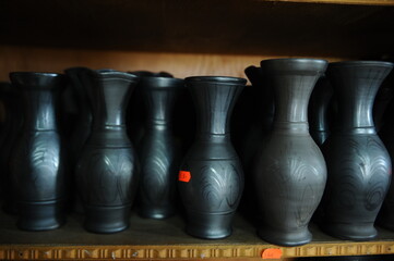 Fototapeta na wymiar Handmade clay objects, raw, waiting to be decorated.