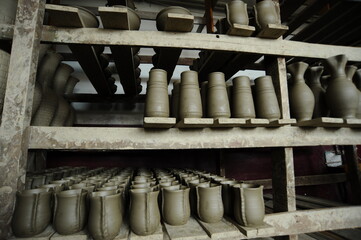 Handmade clay objects, raw, waiting to be decorated.