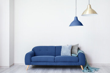 Interior of modern room with blue sofa