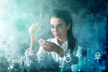 Female alchemist working in laboratory