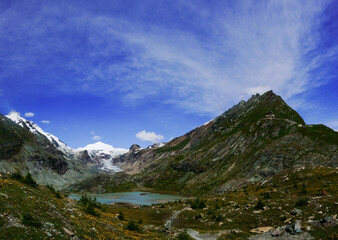 Fototapeta na wymiar wonderful mountain landscape with a glacier and blue sky panorama
