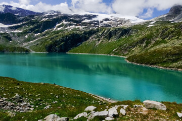 Naklejka na ściany i meble wonderful green water from a water reservoir in the glacier world