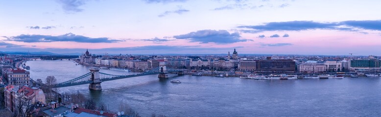 Fototapeta premium Panorama over Budapest and the River Danube during sunset