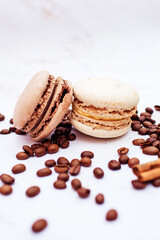 sweet chocolate macaroons with coffee beans. Sweet dessert for tea. Sweets as a gift, a place for text, a place for copying, a banner