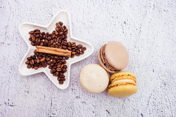 sweet chocolate macaroons with coffee beans. Sweet dessert for tea. Sweets as a gift, a place for text, a place for copying, a banner