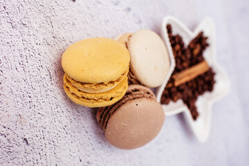 sweet chocolate macaroons with coffee beans. Sweet dessert for tea. Sweets as a gift, a place for text, a place for copying, a banner