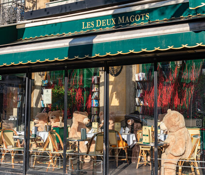 Paris, France - January 09 2021: Customers replaced by Teddy bears in cafe Les Deux Magots during Covid-19 Lockdown