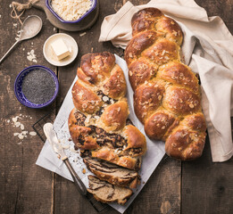 Tsoureki braid, greek easter sweet bread, on wood