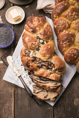 Tsoureki braid, greek easter sweet bread, on wood