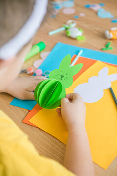 Little Kid Boy Holding Bunny  For Easter Greetings Card. Children's Art Project. DIY Concept