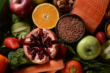 Healthy food background fruits vegetables, salmon, honey, seeds, superfood, cereals,