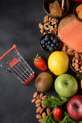 Healthy food background fruits vegetables, salmon, honey, seeds, superfood, cereals,