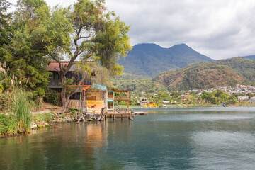 Fototapeta premium Houses beside the Lake Atitlan in Guatemala