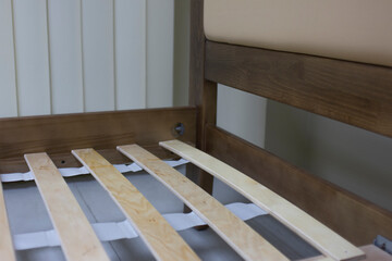 Fototapeta na wymiar Wooden double bed