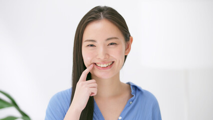 女性・歯