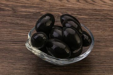 Pickled black olives in the bowl