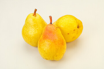 Fresh sweet pear over background