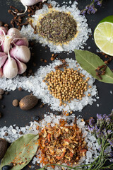 Spices and seeds served  in salt spoon at black background. seasonings, Colorful natural meal additives. healthy food concept.  close up