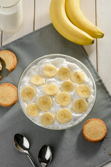 Heavy cream with banana slices. Delicious breakfast dessert