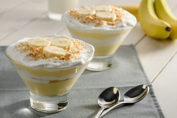 Two portions of banana cream mousse. Delicious desserts on the table