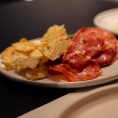 Salumi and crispy fried bread