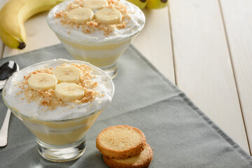 Beautiful banana cream pudding served in two glass bowls