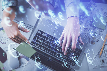 Double exposure of man and woman working together and forex graph hologram drawing. Financial analysis concept. Computer background. Top View.