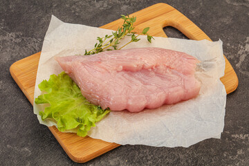 Raw turkey breast steak for cooking