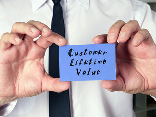  Financial concept about Customer Lifetime Value with sign on the piece of paper.