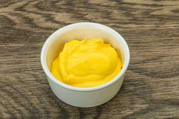 Natural cheese sauce in the bowl