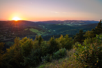 Sunset over hilly, rural countryside in Slovakia in summer
