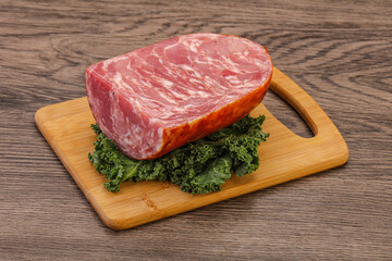 Beef ham piece over board