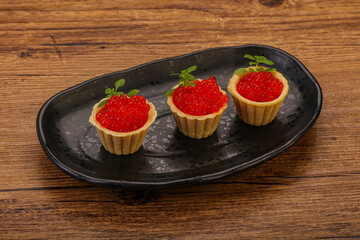 Apetizer - tartlet with red caviar