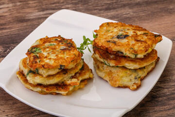 Zucchini pancakes with herbs and spices