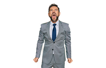 Middle age man wearing business clothes angry and mad screaming frustrated and furious, shouting with anger. rage and aggressive concept.