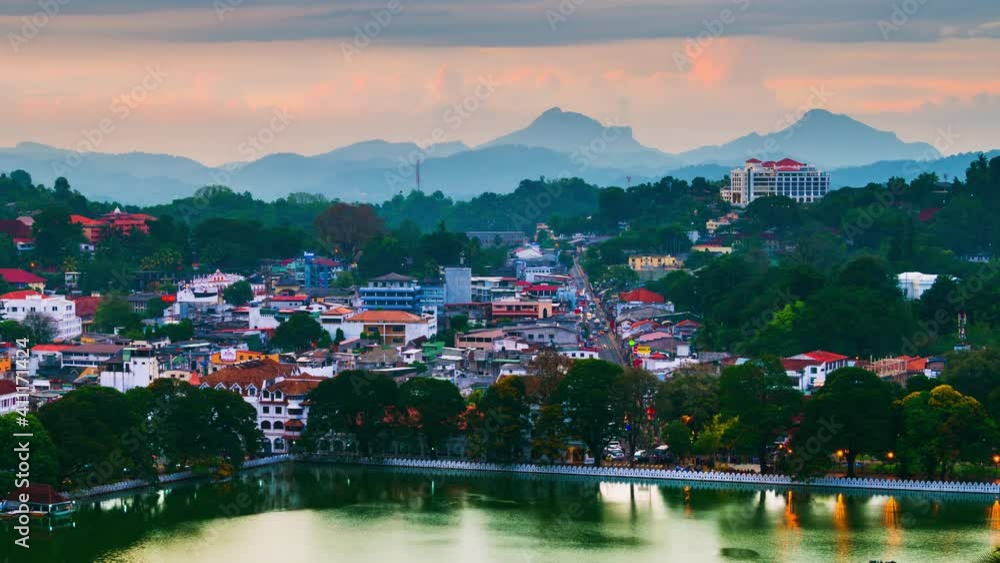 Wall mural kandy, sri lanka. lake in kandy. time-lapse of a sunset over the former capital of sri lanka. panora