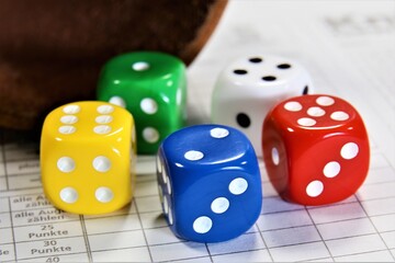 two dice on a wooden table