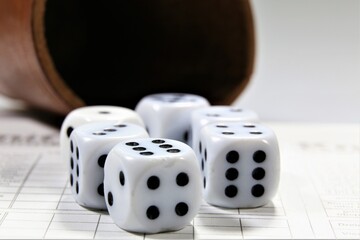 dice on a wooden table