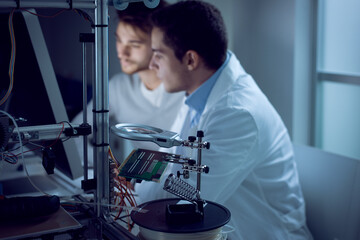 Engineers using a computer