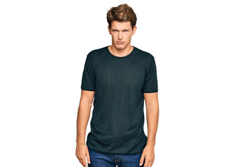 Fototapeta premium Handsome caucasian man wearing casual clothes skeptic and nervous, frowning upset because of problem. negative person.