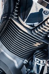 Motorcycle engine with chrome details, close-up