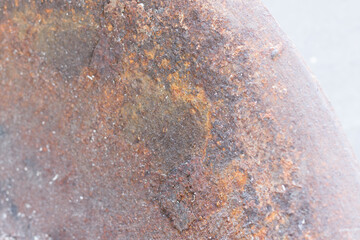 Rusty copper surface bowl with selective focus on sides of the shot