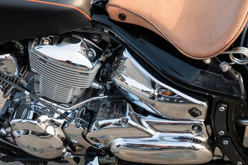 Motorcycle engine with chrome details, close-up