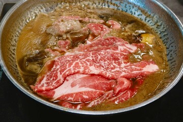 closeup beef shabu in hot pot