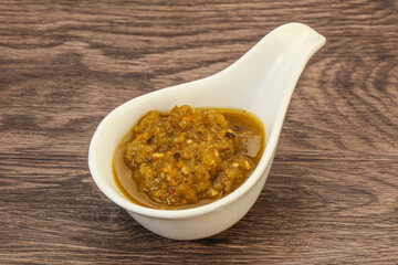 Green spicy sauce in the bowl