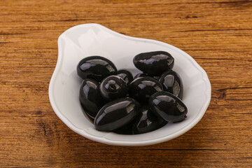Pickled black olives in the bowl
